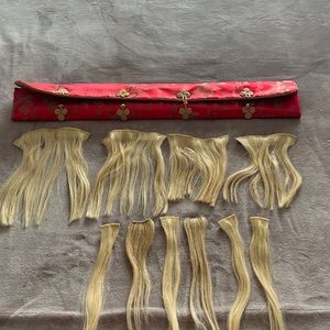 10 piece Blonde hair extensions with a silk storage case